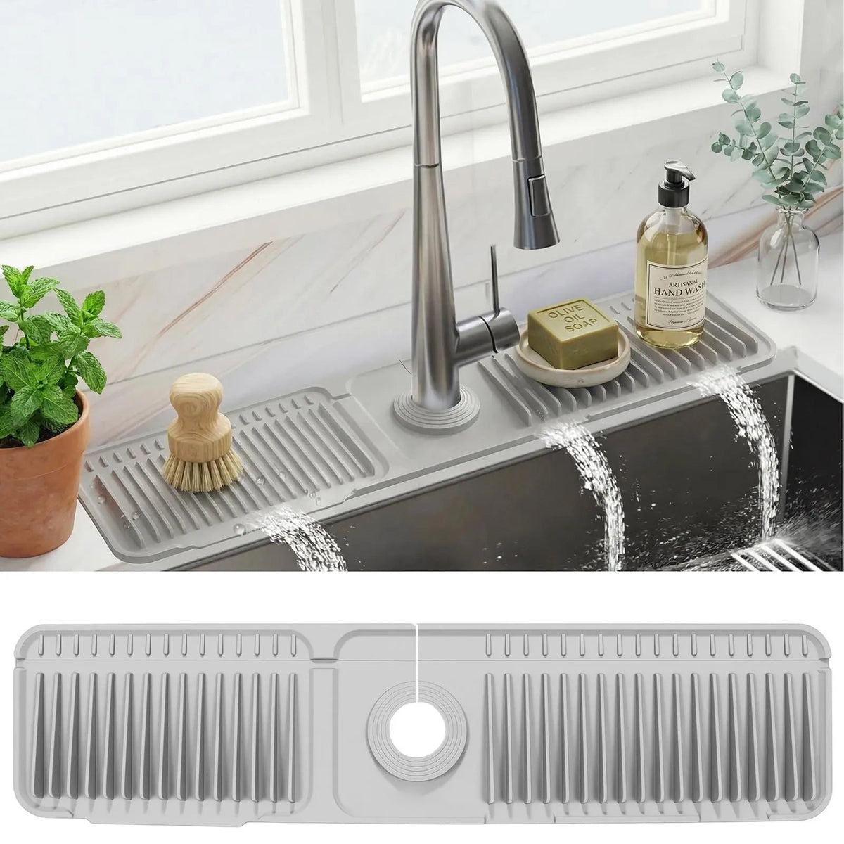 Gray silicone faucet splash guard mat installed behind kitchen sink with auto-drain channels